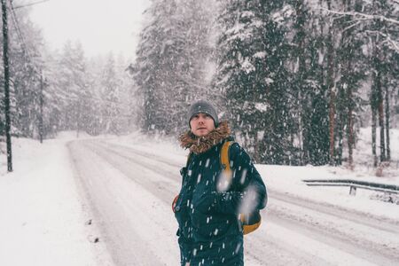 Photo of man for walk in winter forest