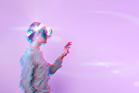 Man is using virtual reality headset. Image with glitch effect.の写真素材