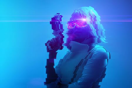 Girl with blaster in the futuristic battle. Image with glitch effect.の写真素材