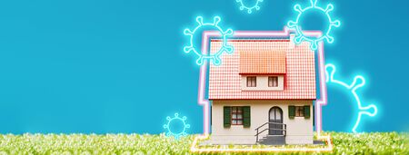 House is protected from attack coronavirus. Concept of staying at home, quarantine, being safe inside the house.の写真素材