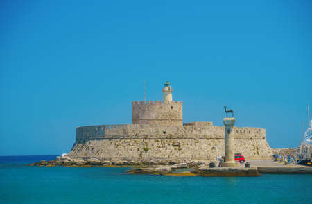 Rhodes, Greece - July 2019: Mandraki harborのeditorial素材