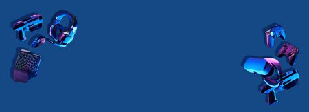 Virtual reality gogles, gamepads and blaster game controllers, games keyboard, mouse and headset.の写真素材