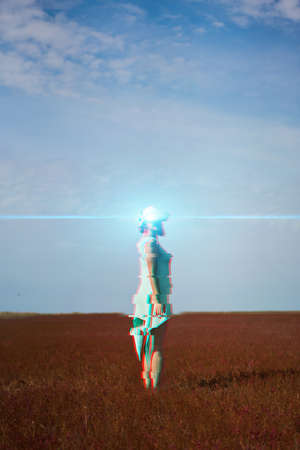 Woman goes into virtual reality using virtual reality headset. Image with glitch effect.の写真素材