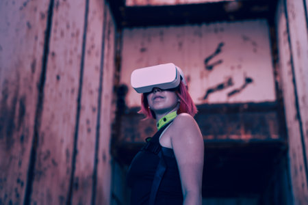 Woman goes into virtual reality using virtual reality headset.の写真素材