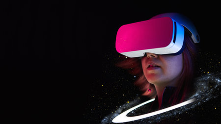 Woman is using virtual reality headset. Elements of this image furnished by NASA.