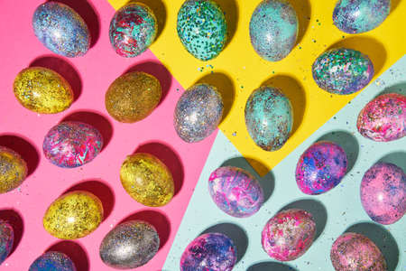 Many colorful shiny eggs. Concept of Happy Easter.の写真素材