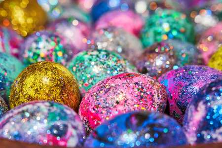 Many colorful shiny eggs. Concept of Happy Easter.の写真素材