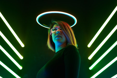 Cyber girl. Beautiful young woman, futuristic style.の写真素材