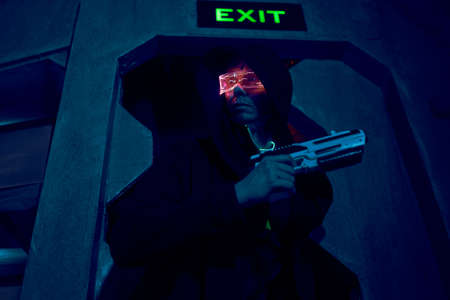 Man with blaster in the futuristic battle. Concept virtual reality, cyber game.