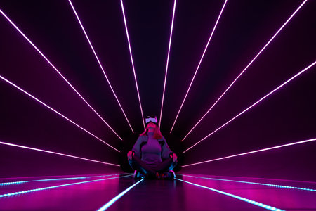 Woman is using virtual reality headset to access in metaverse.の写真素材