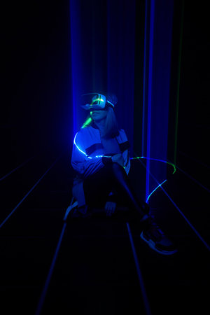 Woman is using virtual reality headset to access in metaverse.
