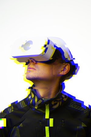 Man is using virtual reality headset. Concept of virtual, augmented and extended reality and...