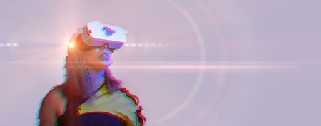 Woman is using virtual reality headset. Concept of virtual, augmented and extended reality and...