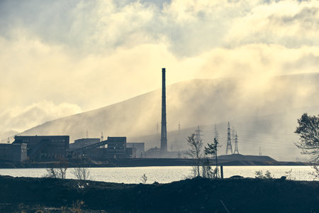 Industrial landscape with heavy pollution produced by a large factory.の写真素材