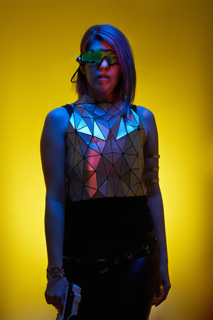 Girl with blaster in the futuristic battle.の写真素材