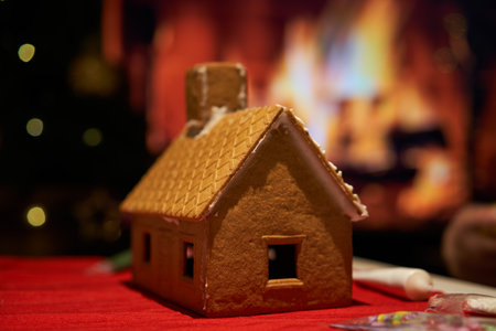 Decorated christmas gingerbread house in homely cozy atmosphere.の写真素材