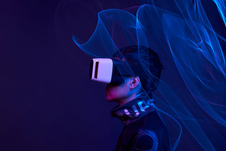 Man is using virtual reality headset to access in metaverse.の写真素材