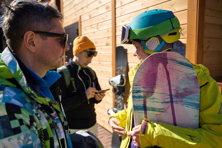 Snowboarder Engaging in Resort Conversation