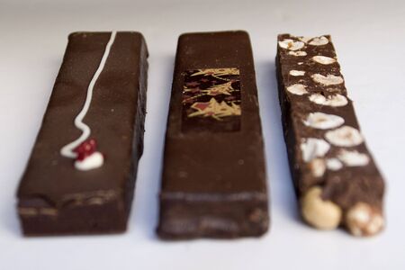 Different types of Christmas nougat: Nougat with nuts, nougat, orange coffee nougat, hazelnut nougat, nougat corn ...の写真素材