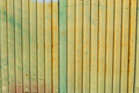 The fence zinc old. The damaged and rust.の写真素材
