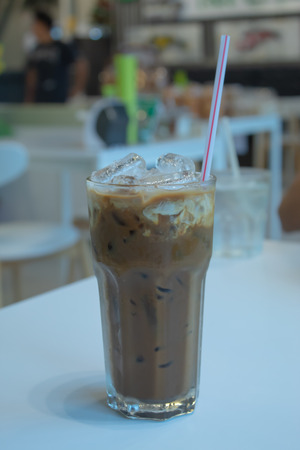 Iced coffee, put the glass on the table.の写真素材