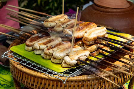 Grilled bananas and crushed it flat. Pour the coconut sweetの写真素材