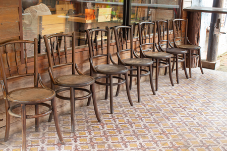 Old wooden chairs in the aislesの写真素材