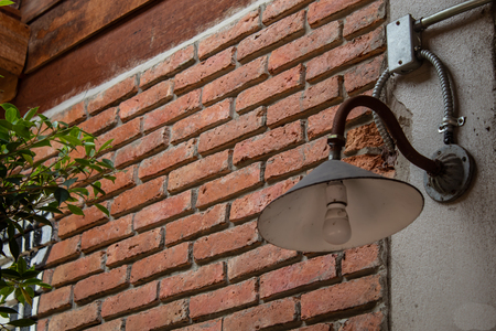 Light on the old brick and wood walls.の写真素材