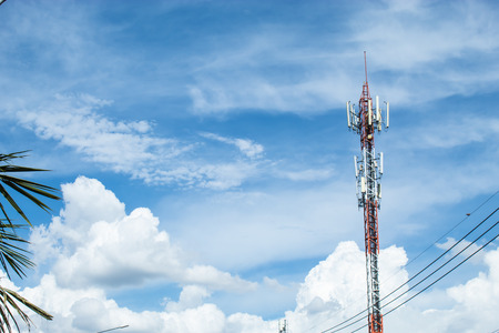 Wave transmission mast, large phone signal with a bright blue sky.の写真素材