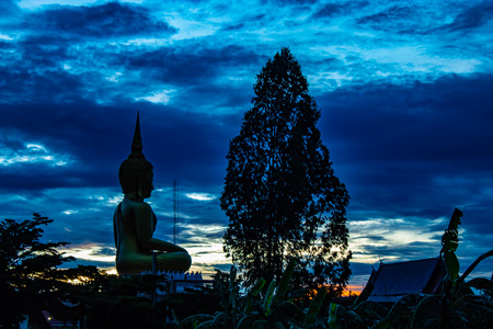 Sunset behind Wat Lad Pha Dook , Temple in Nonthaburi , Thailand.の写真素材