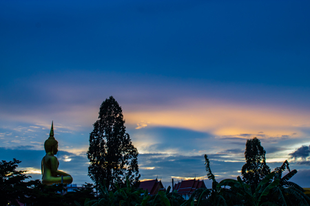 Sunset behind Wat Lad Pha Dook , Temple in Nonthaburi , Thailand.の写真素材