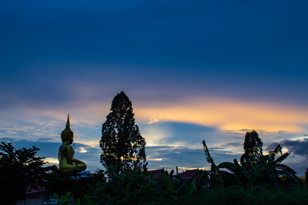 Sunset behind Wat Lad Pha Dook , Temple in Nonthaburi , Thailand.の写真素材