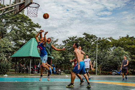 Bang Yai , Nonthaburi , Basketball player of Philippine and Thai, playing basketball for health in the morning at the park. 10 June 2018のeditorial素材