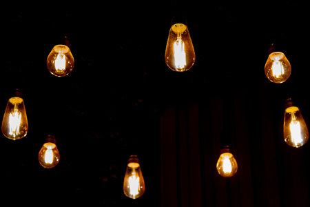 Round light bulbs for illumination at nightの写真素材