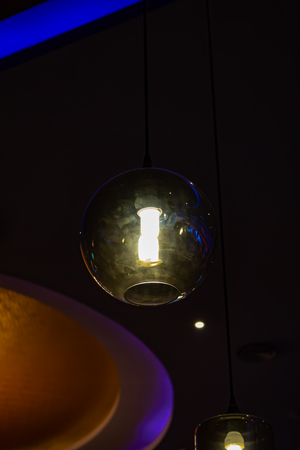 Round light bulbs for illumination at nightの写真素材
