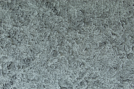 A rough cement walls painted white.の写真素材