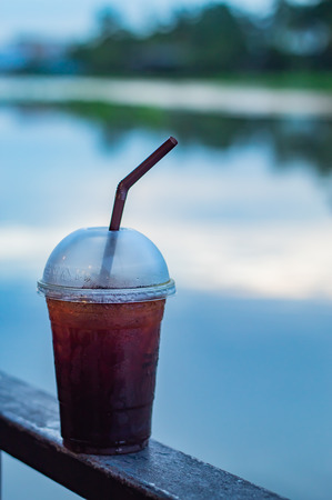 The Black coffee cool Blur background river.の写真素材