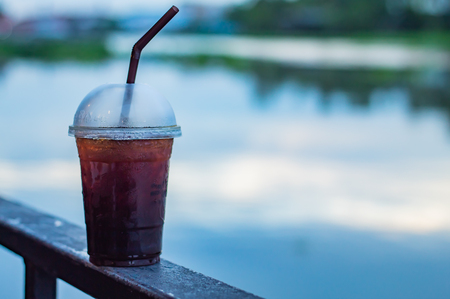 The Black coffee cool Blur background river.の写真素材