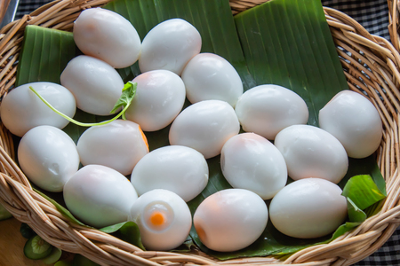 Boiled eggs peeled on the banana leaves.の写真素材