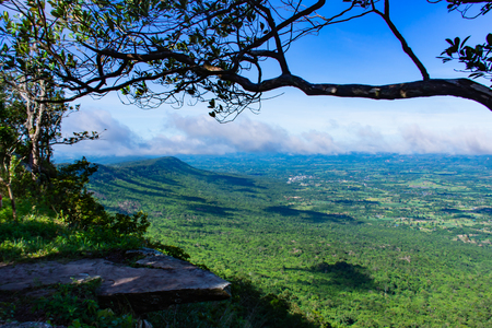 The point of view of the mountains and the town of Chaiyaphum at Pha Hum Hod in Chaiyaphum , Thailand.の写真素材