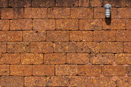 Laterite brick wall Used as background.の写真素材