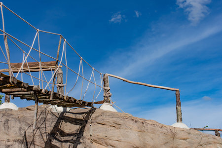 Wooden bridge on the rocks and a beautiful sky at Chaiyaphum in Thailand.の写真素材