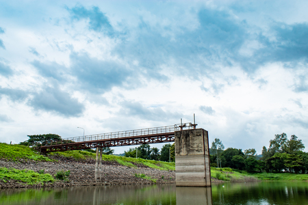 The iron bridge in the reservoir at the Huai Pa Daeng Reservoir , Phetchabun in  Thailand.の写真素材