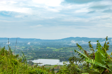 Morning mist above the reservoir and the trees at Phetchabun in Thailand.の写真素材