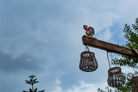 light bulb suspended outdoor background is the sky.の写真素材