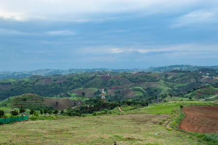 High voltage transmission towers on the mountain at Windtime Khao kho , Phetchabun in Thailand.の写真素材