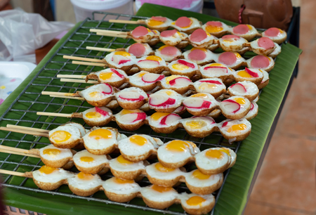 Deep-fried quail eggs Plug with bamboo.の写真素材