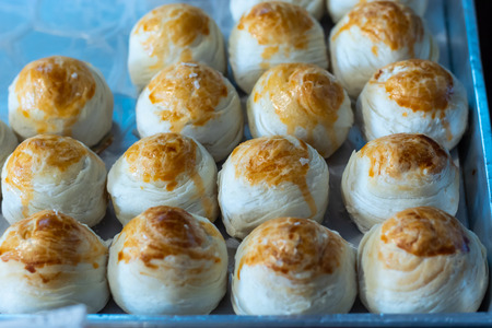 Chinese cakes on a tray of empty time.の写真素材
