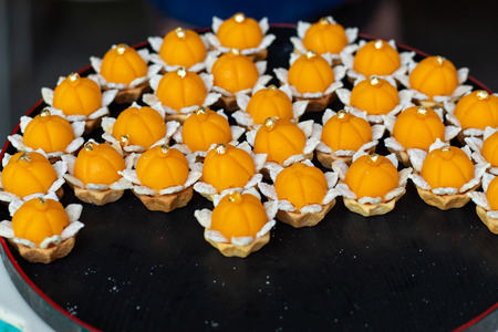 Golden Crown Candy a dessert of Thailand Candy Gold, placed on a tray.の写真素材