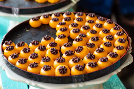 Golden Crown Candy a dessert of Thailand Candy Gold, placed on a tray.の写真素材